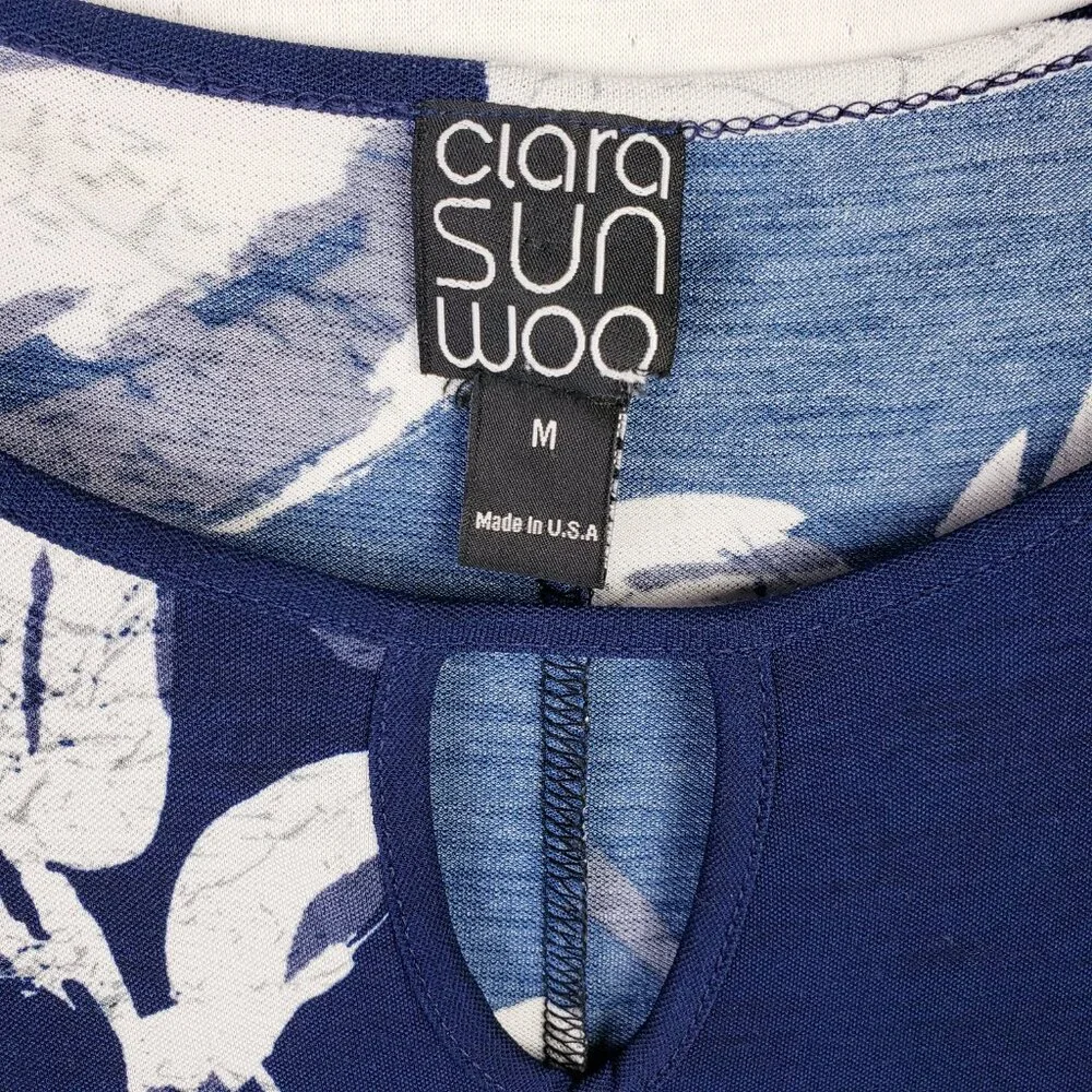 Clara Sun Woo USA Tunic Top Stretch Floral Print Sharkbite Hem size M Relaxed